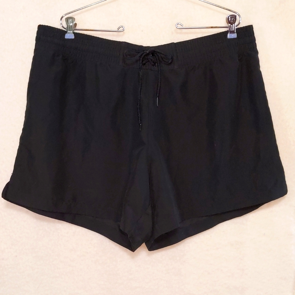 Black Kona Sol board shorts. 16W/18W